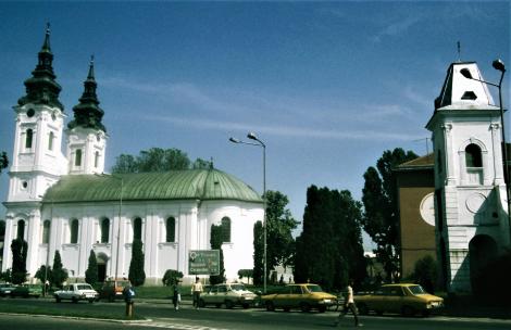 Lugosch: Orthodoxe Kirche [links] und Turm der Nikolauskirche [rechts] (1991)